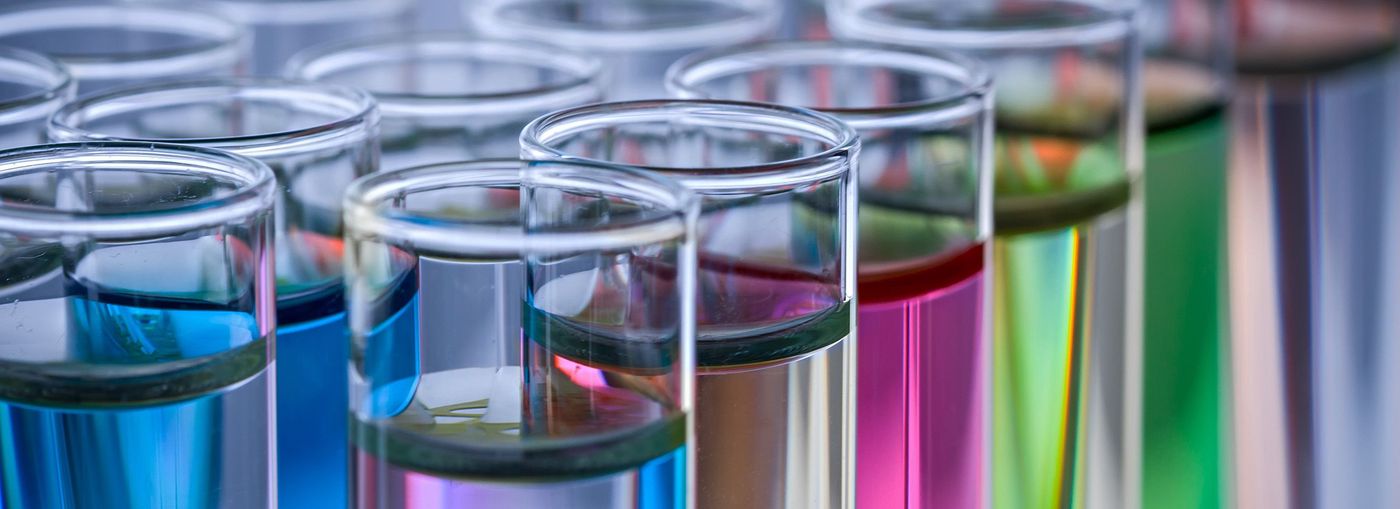 Labratory glasses containing fluids in various colors