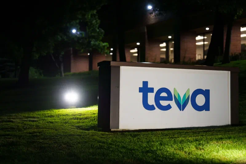 Night photo of a Teva pharmaceuticals sign
